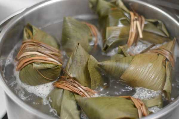 电饭锅煮粽子按什么键（用电饭锅煮粽子按什么键）